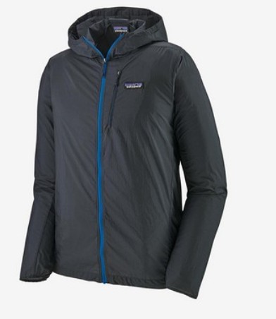 A black jacket with a blue zipperDescription automatically generated